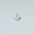 product image of a sterling silver wren charm on a chain necklace facing right